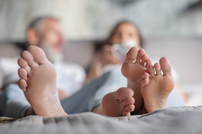 Cozy,morning.,man,and,woman,staying,in,bed,together,in
